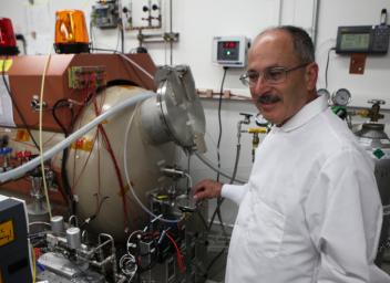 One investigation on NASA's Mars 2020 rover will extract oxygen from the Martian atmosphere. It is called MOXIE, for Mars Oxygen In-Situ Resource Utilization Experiment. Shown here is Michael Hecht, of MIT in the development lab at JPL.