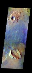 The THEMIS camera contains 5 filters. The data from different filters can be combined in multiple ways to create a false color image. This image from NASA's 2001 Mars Odyssey spacecraft shows part of the plains in Arabia Terra.