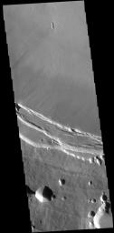 This image captured by NASA's 2001 Mars Odyssey spacecraft shows part of the summit caldera of Arsia Mons.