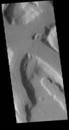 This image captured by NASA's 2001 Mars Odyssey spacecraft is located on the eastern margin of Terra Sabaea.