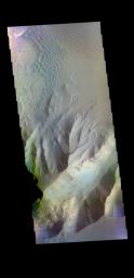 The THEMIS camera contains 5 filters. The data from different filters can be combined in multiple ways to create a false color image. This image from NASA's 2001 Mars Odyssey spacecraft shows part of Juventae Chasma.