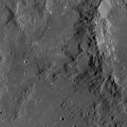 Smooth terrain around the western rim of Ikapati Crater on Ceres is visible in this image from NASA's Dawn spacecraft. The area contains material ejected from Ikapati during its formation.