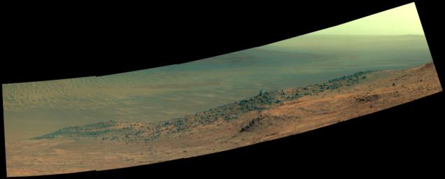 This enhanced color scene from NASA's Mars Exploration Rover Opportunity shows 'Wharton Ridge,' which forms part of the southern wall of 'Marathon Valley' on the western rim of Endeavour Crater.