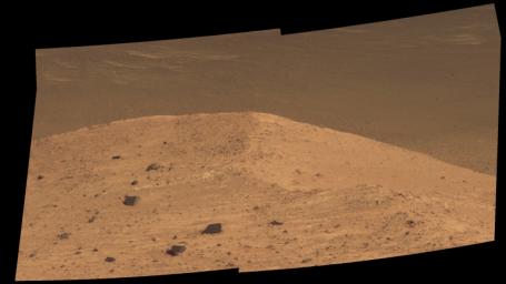 This scene from the panoramic camera (Pancam) on NASA's Mars Exploration Rover Opportunity shows 'Spirit Mound' overlooking the floor of Endeavour Crater.