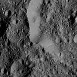 This view, taken on June 17, 2016 from NASA's Dawn spacecraft, shows the rim of Ernutet Crater (32 miles, 52 kilometers in diameter) on Ceres.