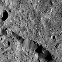 NASA's Dawn spacecraft views a portion of the northern rim of Urvara Crater (101 miles, 163 kilometers wide) in this scene from Ceres taken on June 3, 2016, at a distance of about 240 miles (385 kilometers) above the surface.