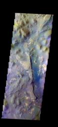 The THEMIS camera contains 5 filters. The data from different filters can be combined in multiple ways to create a false color image. This image from NASA's 2001 Mars Odyssey spacecraft shows part of Aureum Chaos.