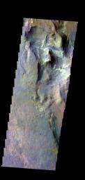 The THEMIS camera contains 5 filters. The data from different filters can be combined in multiple ways to create a false color image. This image from NASA's 2001 Mars Odyssey spacecraft shows part of Terby Crater.