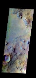 The THEMIS camera contains 5 filters. The data from different filters can be combined in multiple ways to create a false color image. This image from NASA's 2001 Mars Odyssey spacecraft shows part Syrtis Major Planum.