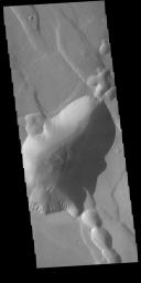 This image captured by NASA's 2001 Mars Odyssey spacecraft shows a small portion of Noctis Labyrinthus. Noctis Labyrinthus is a network of tectonic graben and collapse valleys on the western margin of Valles Marineris.
