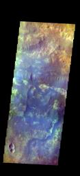 The THEMIS camera contains 5 filters. The data from different filters can be combined in multiple ways to create a false color image. This image from NASA's 2001 Mars Odyssey spacecraft shows part of Mawrth Vallis.