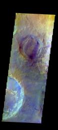 The THEMIS camera contains 5 filters. The data from different filters can be combined in multiple ways to create a false color image. This image from NASA's 2001 Mars Odyssey spacecraft shows eroded craters in northern Meridiani Planum.