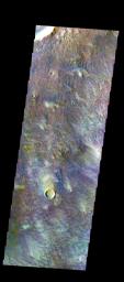 The THEMIS camera contains 5 filters. The data from different filters can be combined in multiple ways to create a false color image. This image from NASA's 2001 Mars Odyssey spacecraft shows some of the floor of Newton Crater.