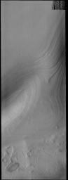 This image captured by NASA's 2001 Mars Odyssey spacecraft shows the layering of the South Polar cap of Mars.
