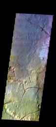 The THEMIS camera contains 5 filters. Data from different filters can be combined in multiple ways to create a false color image. This image from NASA's 2001 Mars Odyssey spacecraft shows part of the plains of Margaritifer Terra.