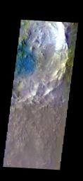 The THEMIS camera contains 5 filters. Data from different filters can be combined in multiple ways to create a false color image. This image from NASA's 2001 Mars Odyssey spacecraft shows the floor of an unnamed crater in Arabia Terra.