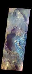 The THEMIS camera contains 5 filters. Data from different filters can be combined in multiple ways to create a false color image. This image from NASA's 2001 Mars Odyssey spacecraft shows part of the floor of Rabe Crater.