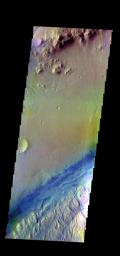 The THEMIS camera contains 5 filters. The data from different filters can be combined in multiple ways to create a false color image. This image from NASA's 2001 Mars Odyssey spacecraft shows part of the floor of Gale Crater.