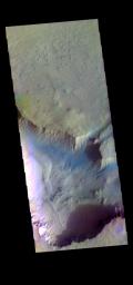 The THEMIS camera contains 5 filters. The data from different filters can be combined in multiple ways to create a false color image. This image from NASA's 2001 Mars Odyssey spacecraft shows more of Asimov Crater.