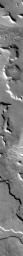 In this image, NASA's 2001 Mars Odyssey spacecraft spies what looks like the letter L, or maybe someone sitting down.
