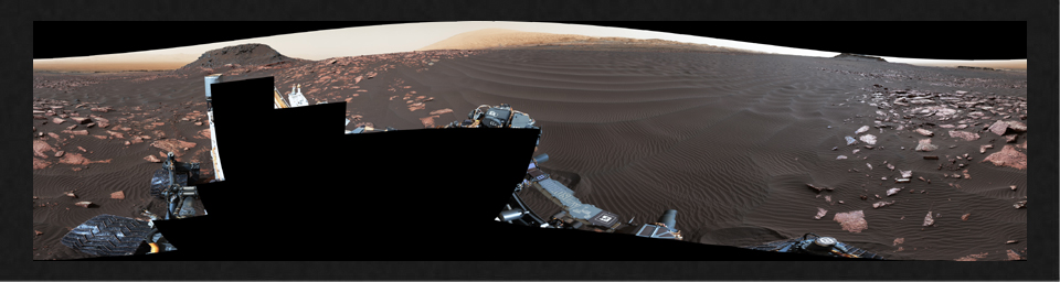A rippled linear dune of dark Martian sand, 'Nathan Bridges Dune,' dominates this full-circle panorama from NASA's Curiosity Mars rover.
