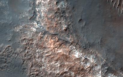 This image from NASA's Mars Reconnaissance Orbiter shows Gorgonum Basin, one of several large basins within the Terra Sirenum region of Mars. Each basin has light-toned mounds, many of which contain clays.