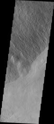 This image captured by NASA's 2001 Mars Odyssey spacecraft shows part of the southeastern flank of Ascraeus Mons.