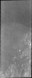 This image from NASA's 2001 Mars Odyssey spacecraft shows Siton Undae, a large dune field located in the northern plains near Escorial Crater on Mars. This image shows part of the central region of the dune field.