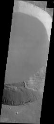 This image from NASA's 2001 Mars Odyssey spacecraft shows part of the smaller summit caldera of Pavonis Mons. This caldera is approximately 5km deep. Pavonis Mons is one of the three aligned Tharsis Volcanoes.