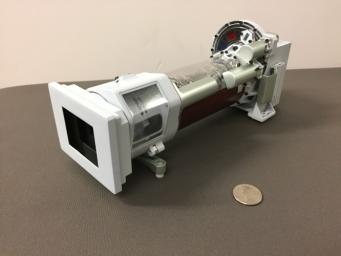 This image shows a 3-D printed model of Mastcam-Z, one of the science cameras on NASA's Mars 2020 rover. Mastcam-Z will include a 3:1 zoom lens.