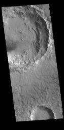 Bonestell Crater is a relatively young crater located in Acidalia Planitia. The grooved surface of the ejecta blanket is evident in this image from NASA's 2001 Mars Odyssey spacecraft.