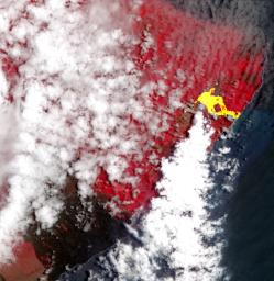 Hawaii's Kilauea's eruption, which began three weeks ago, has produced new lava flows that reached the ocean. NASA's Terra spacecraft acquired this image on May 22, 2018.
