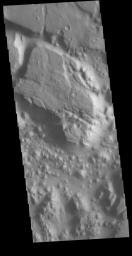 This image from NASA's Mars Odyssey shows a small section on Margaritifer Chaos. The term chaos is applied to regions where the surface is being eroded to form mesas.