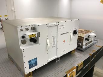 NASA's Cold Atom Laboratory consists of two standardized containers that will be installed on the International Space Station. The larger container is called a quad locker, and the smaller container is called a single locker.