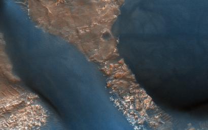 This image acquired on March 29, 2011 by NASA's Mars Reconnaissance Orbiter, shows dunes with ripples on their upwind slopes and dark streaks on their downwind slopes.