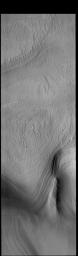 This image from NASA's Mars Odyssey shows the south polar cap during the middle of southern hemisphere summer. The surface is free of frost and the layering that makes up the cap is visible.