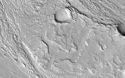 This image acquired on December 9, 2018 by NASA's Mars Reconnaissance Orbiter, shows Athabasca Valles with lava flows originating from Elysium Mons to the northwest.
