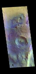This image from NASA's Mars Odyssey shows an unnamed crater in Arabia Terra. Dark blue tones in false color indicate basaltic sands.