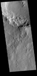 This image from NASA's Mars Odyssey shows part of the rim of an unnamed crater in Terra Cimmeria.