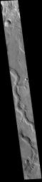 This image from NASA's Mars Odyssey shows a section of Naktong Vallis. Located in Terra Sabaea, Naktong Vallis is 670 km long (415 miles).
