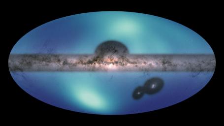 Images of the Milky Way and the Large Magellanic Cloud (LMC) are overlaid on a map of the surrounding galactic halo. The smaller structure is a wake created by the LMC's motion through this region.