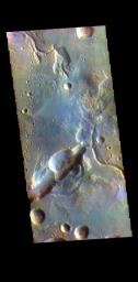 This image from NASA's Mars Odyssey shows the northern margin of Arabia Terra. Numerous unnamed channels dissect this region of Arabia Terra, flowing downward into Acidalia Planitia.