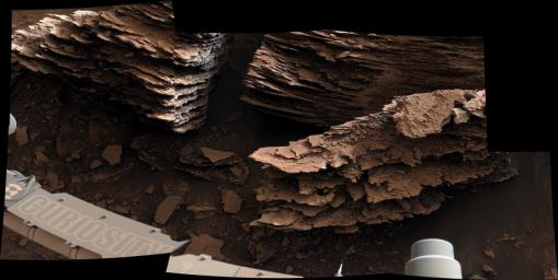NASA's Curiosity Mars rover captured this view of layered, flaky rocks believed to have formed in an ancient streambed or small pond. The six images that make up this mosaic were captured using Curiosity's Mast Camera, or Mastcam, on June 2, 2022.
