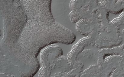 This image acquired on July 14, 2022 by NASA's Mars Reconnaissance Orbiter shows an area in the South Polar cap.