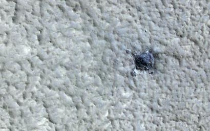 This image acquired on November 28, 2022 by NASA's Mars Reconnaissance Orbiter shows impact disturbed dust over an area more than two kilometers wide, large enough to be visible in MARCI daily global images.