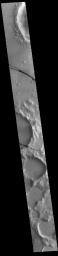 This image from NASA's Mars Odyssey shows a section of Cerberus Fossae. Cerberus Fossae are located in Elysium Planitia, southeast of the Elysium Mons volcanic complex.