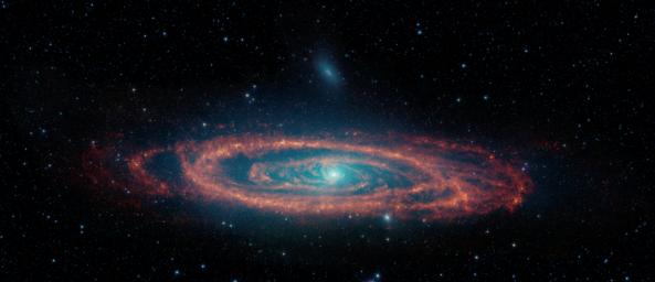 This image from NASA's retired Spitzer Space Telescope highlights the stars and dust clouds in the Andromeda galaxy.