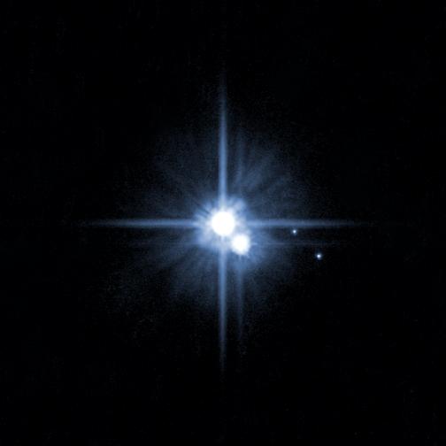 Pluto und seine Monde: Charon, Nix, und Hydra; HST, NASA 