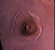 Shown here is a digital mosaic of Olympus Mons, the largest known volcano in the Solar System, as seen by NASA's Viking Orbiter 1. Much of the plains surrounding the volcano are covered by the ridged and grooved 'aureole' of Olympus Mons.