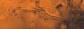 Valles Marineris, the great canyon of Mars. This scene shows the entire canyon system, extending from Noctis Labyrinthus, the arcuate system of graben to the west, to the chaotic terrain to the east, as seen by NASA's Viking spacecraft.